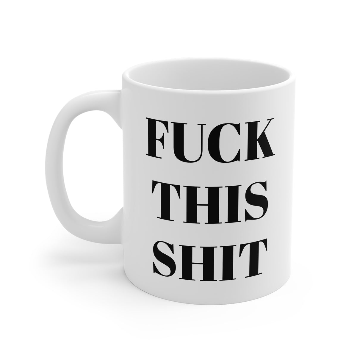 A white ceramic coffee mug with bold black humorous text printed on the front, shown against a plain white background.