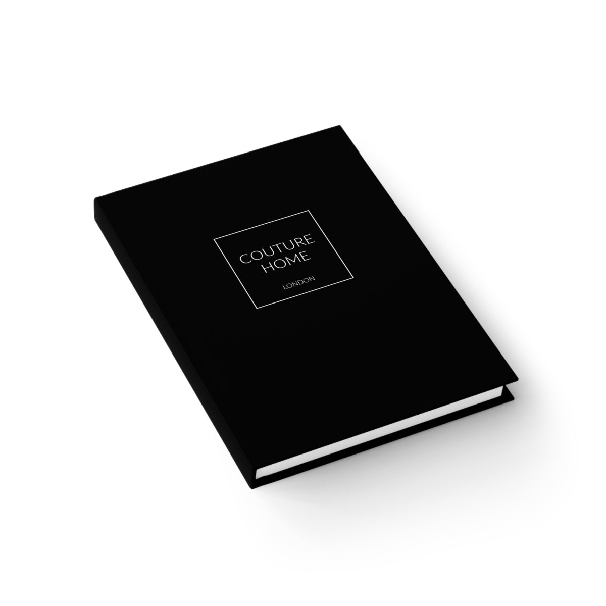 Black notebook with Couture Home London logo in the centre.