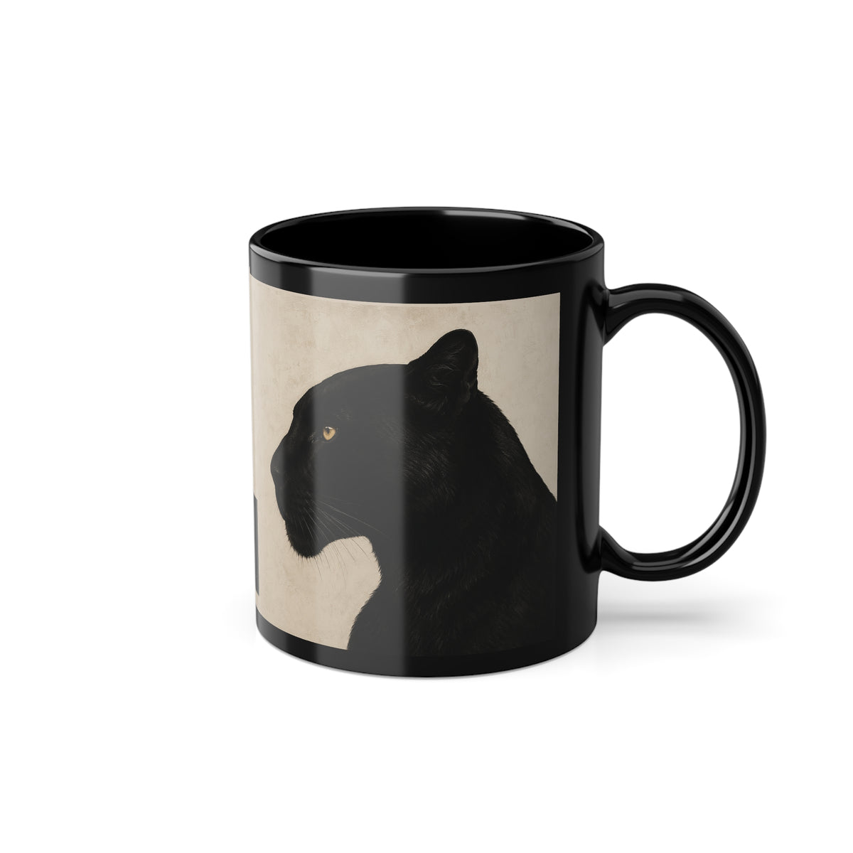 A glossy black ceramic mug featuring a printed graphic of a black panther silhouette on a textured beige background, shown against a plain white studio backdrop.