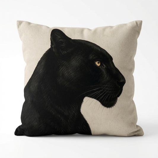 A square throw pillow in a light beige linen-like fabric, featuring a realistic printed graphic of a black panther in profile with yellow eyes.