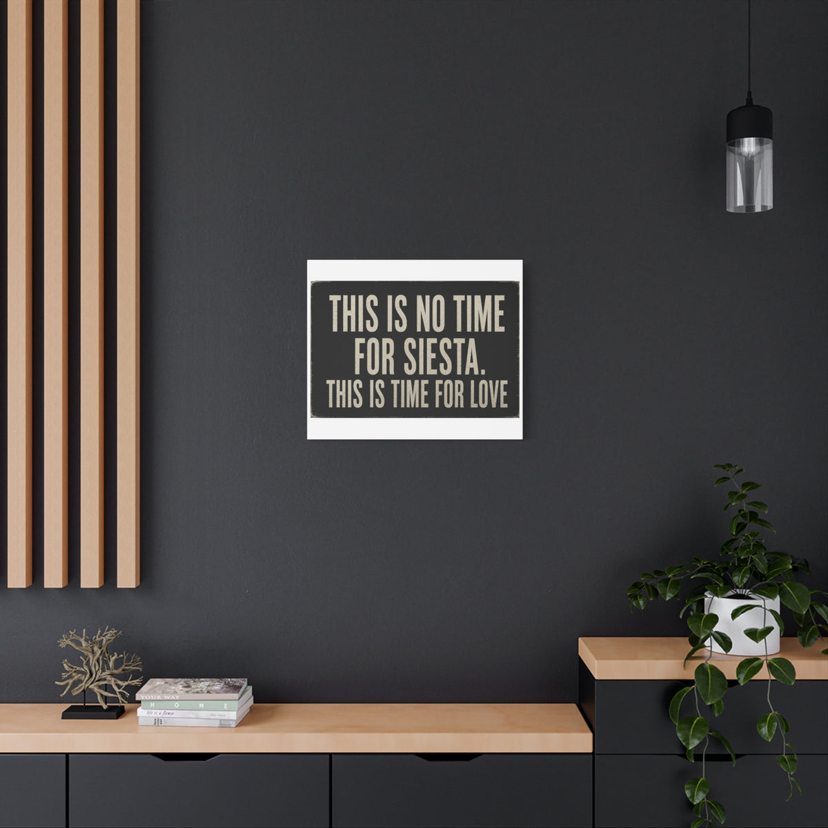 Black wall art print with the text 'THIS IS NO TIME FOR SIESTA. THIS IS TIME FOR LOVE' by Couture Home London