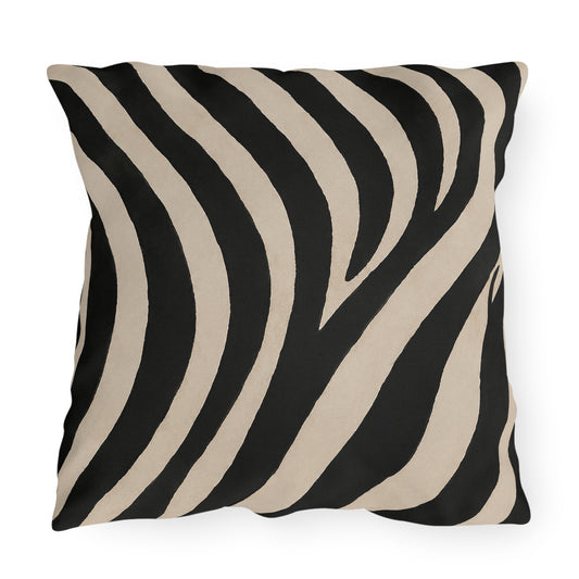 A square throw pillow featuring a bold black and beige zebra stripe pattern, shown against a plain white background.